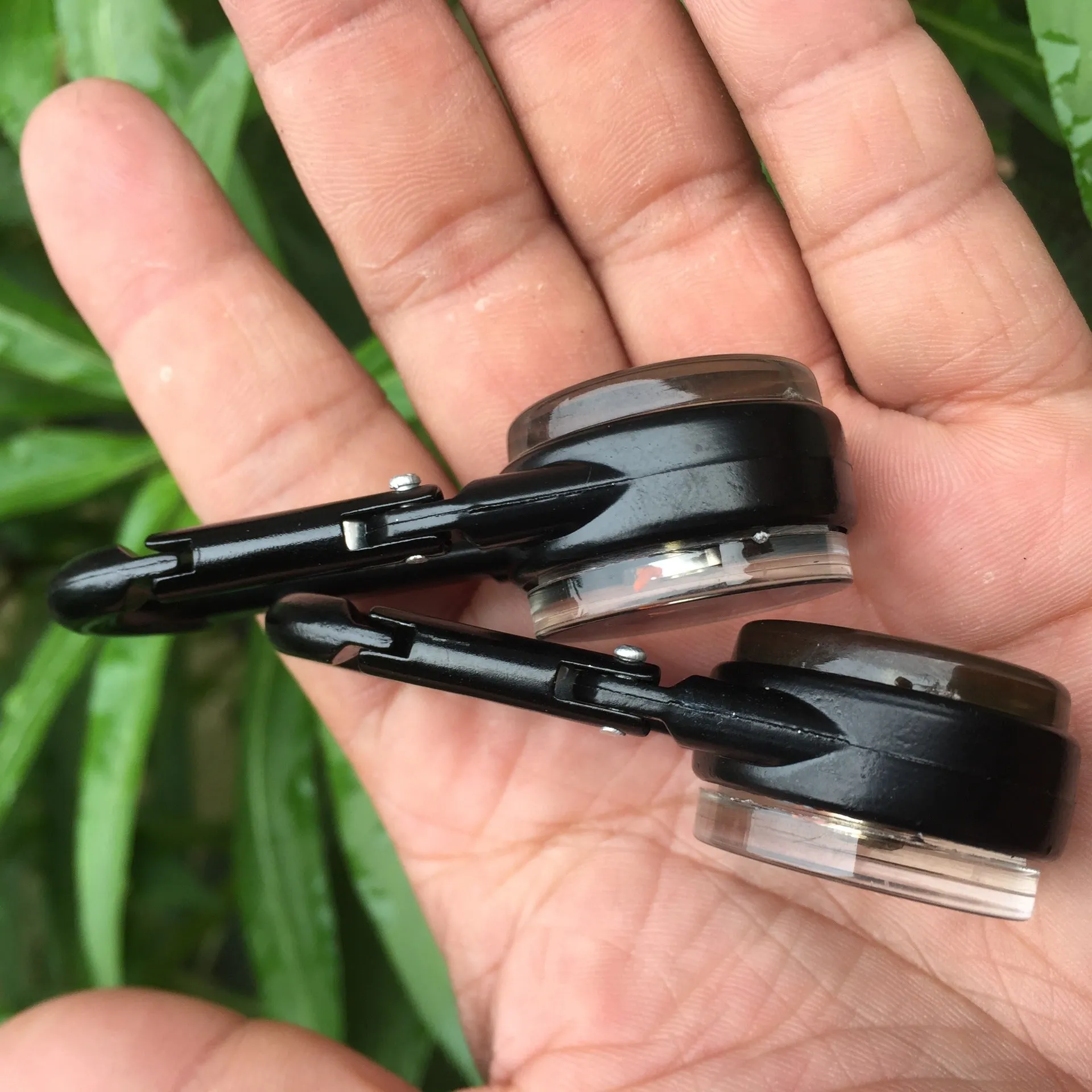 Black zinc alloy carabiner with liquid thermometer display and climbing button mechanism