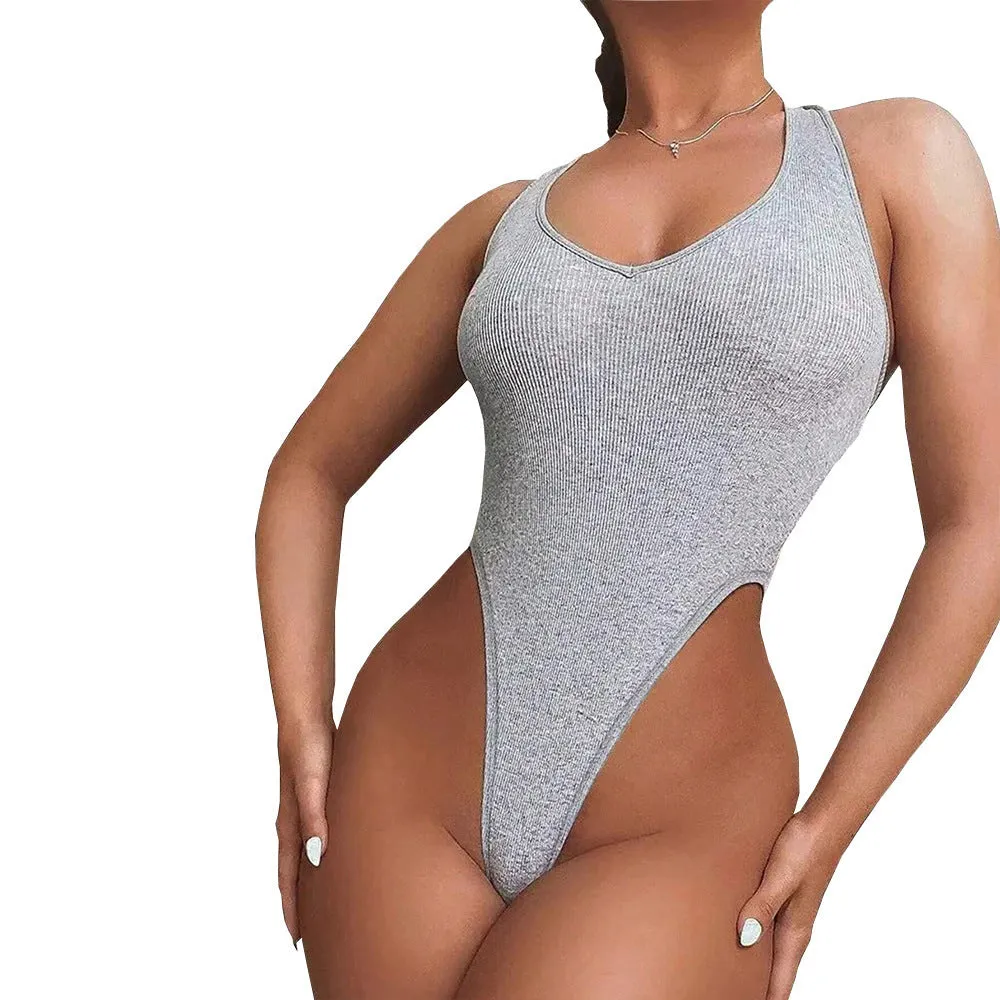 Grey women's halter neck jumpsuit with suspenders vest design and shorts.