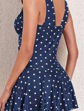 Women's blue polka dot print bikini swimsuit shown on mannequin with separate top and shorts