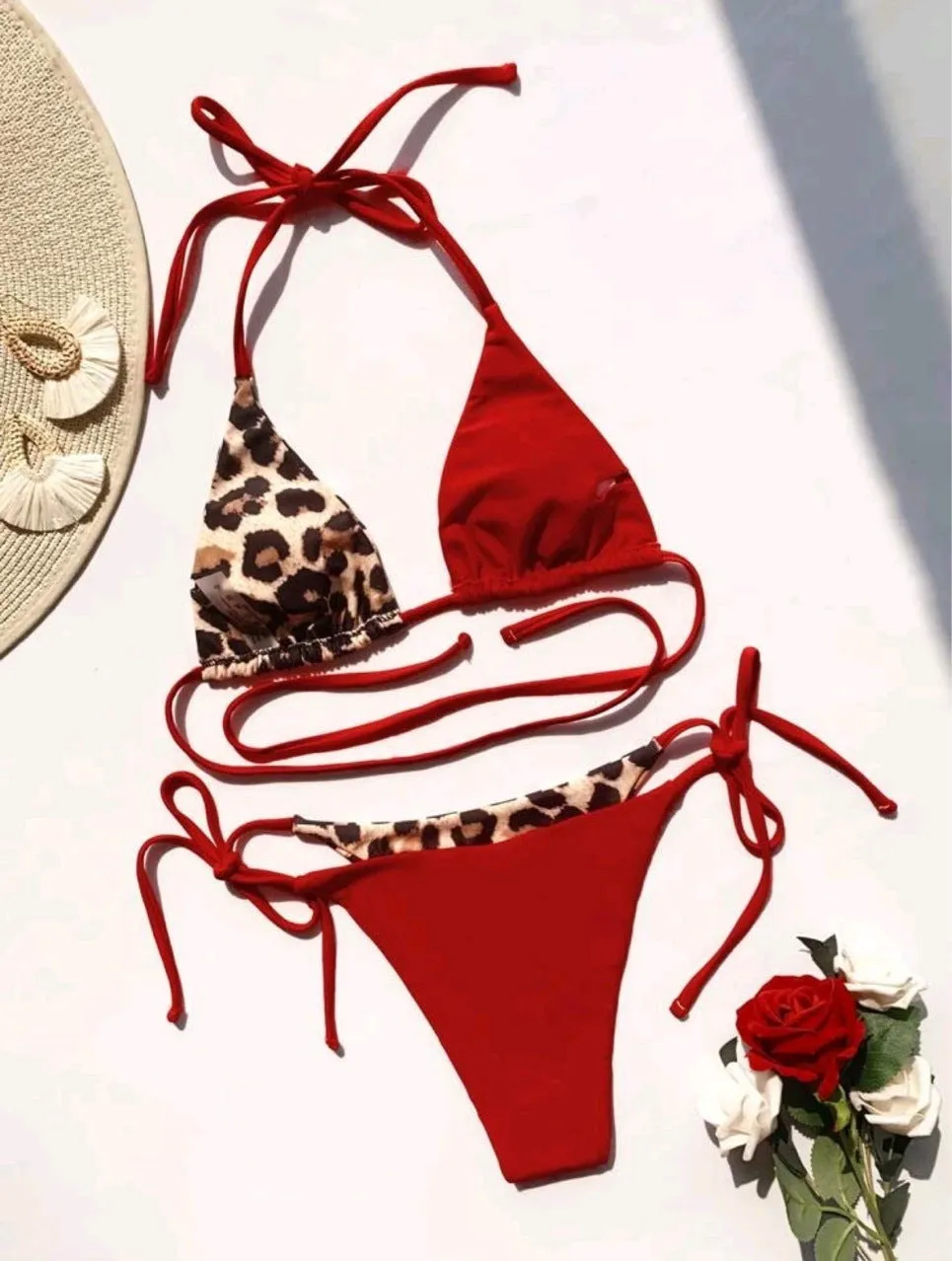 Women's red leopard print halter bikini with lace-up front and adjustable side ties
