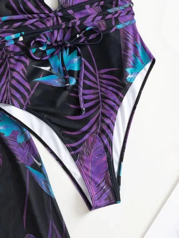 Women's polyester three-piece swimsuit bikini set with a matching cover-up coat in a patterned design.