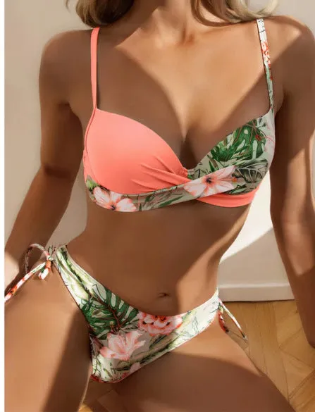 Women's green push-up bikini top and matching split drawstring briefs laid flat.