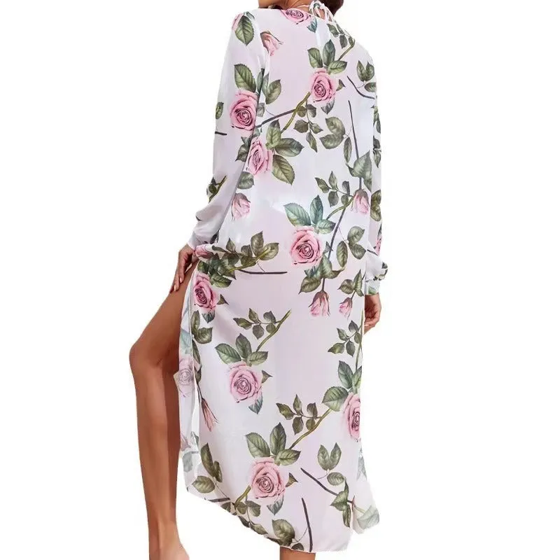 White printed three-piece women's swimsuit bikini set with bra, shorts, and long sleeve blouse.