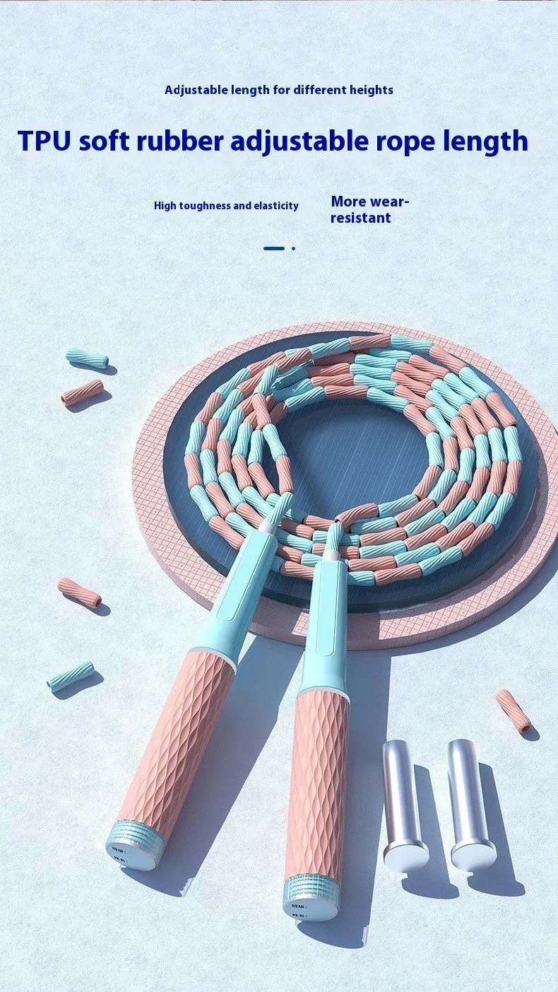 Children's bamboo bead skipping rope in blue, green, pink, or purple on a 2.8m cord.