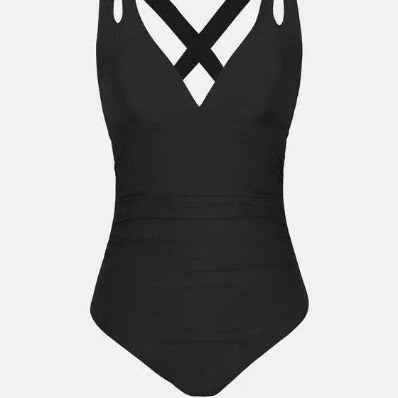 Women's solid colour one-piece swimsuit with bikini triangle top and cross shoulder straps.