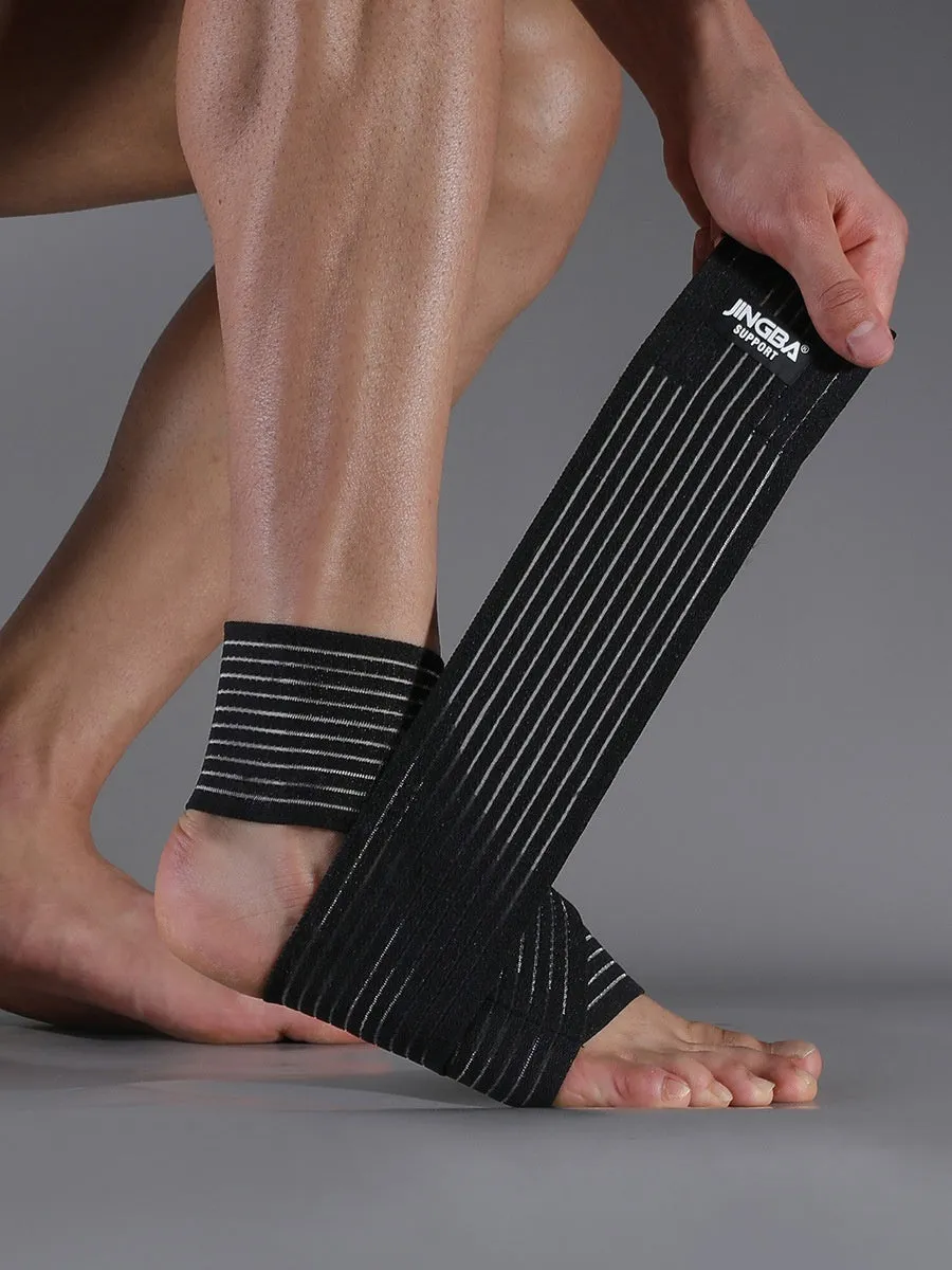 Black adjustable sports ankle support bandage wrapped around a joint