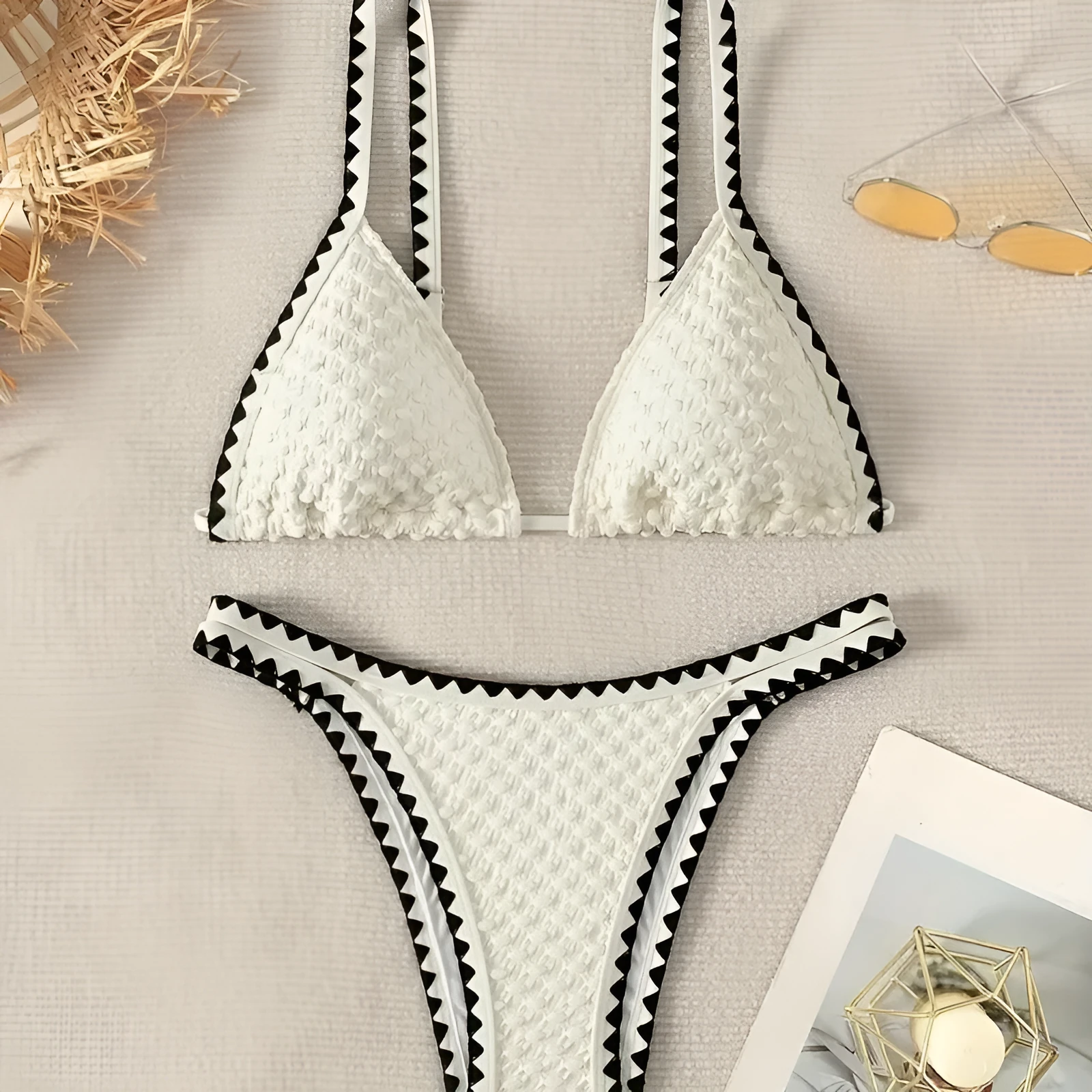 Women's two-piece split bikini swimsuit in white and blue colours with brief-style cut