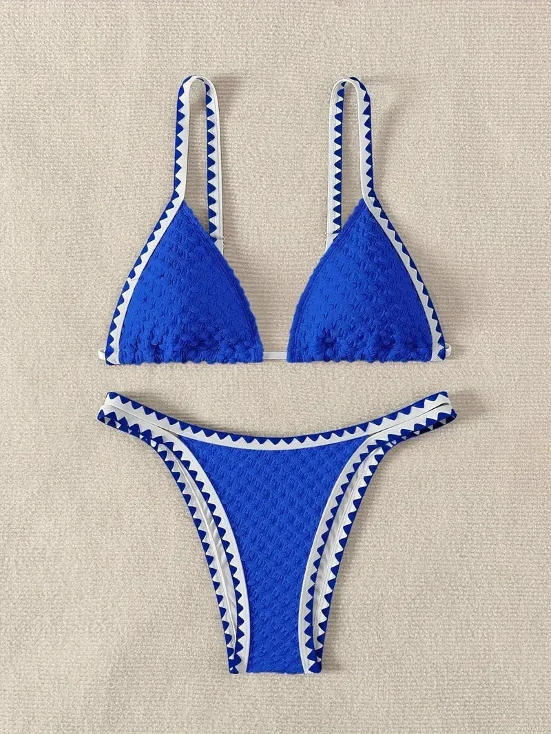 Women's two-piece split bikini swimsuit in white and blue colours with brief-style cut