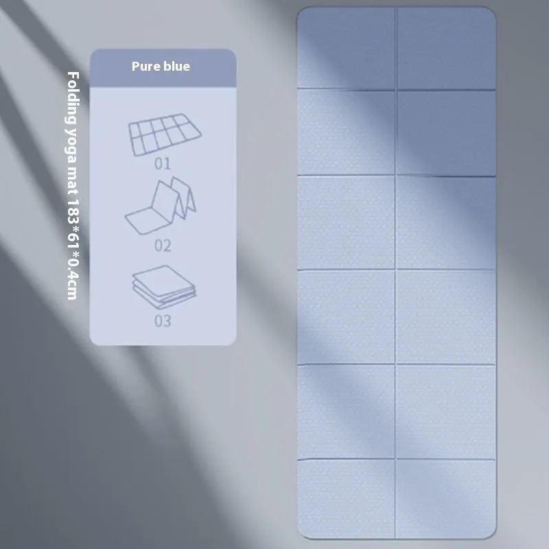 A folded and unfolded purple TPE yoga mat on a wooden floor, showing its size and folding design.