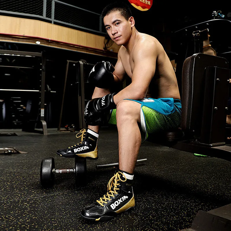 Mixed combat training high-top wrestling shoes in green, with mesh and leather upper and rubber sole.