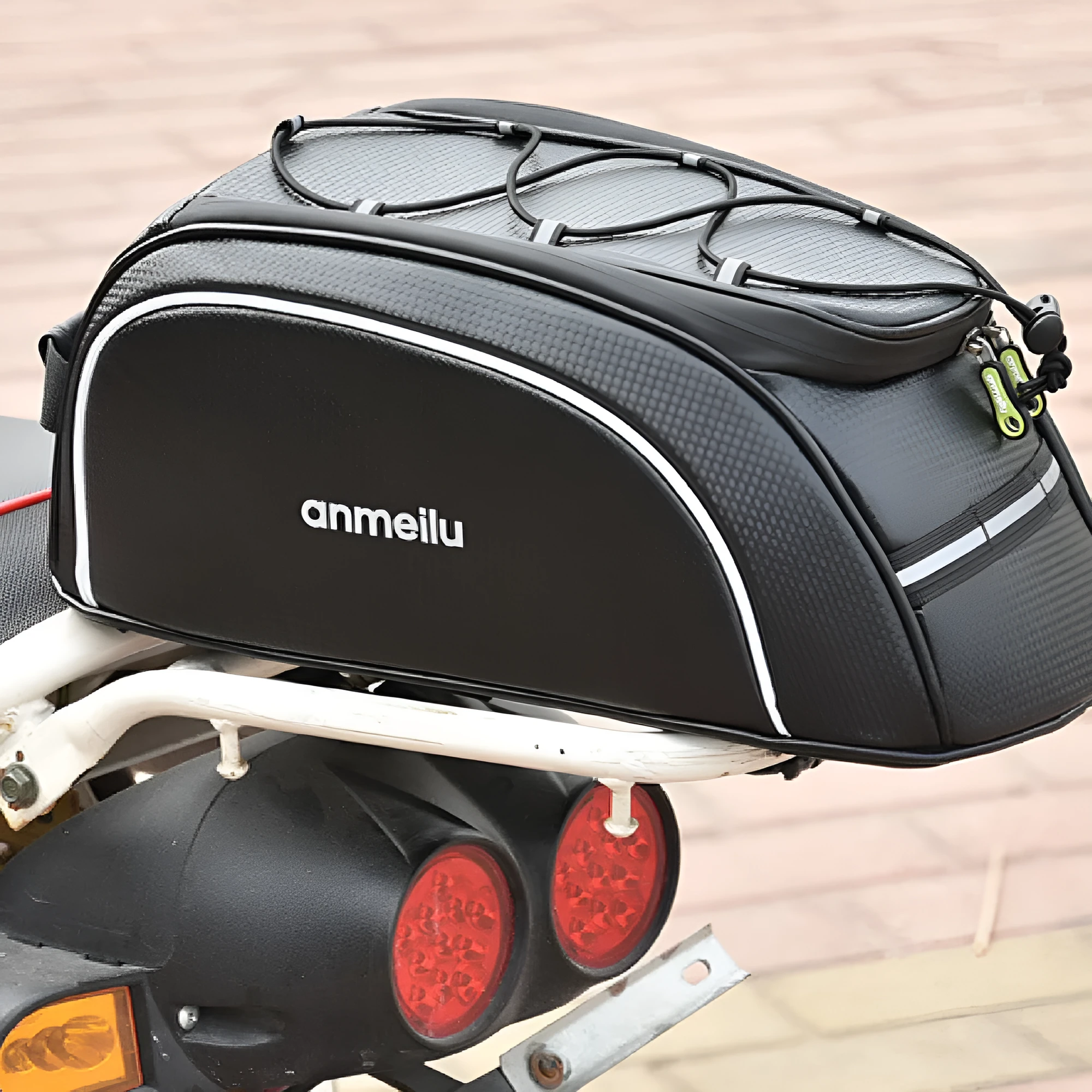 Waterproof black bicycle rack bag mounted on rear bicycle rack showing 8-litre capacity dimensions