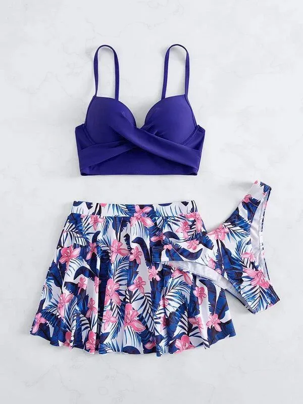 Women's three-piece bikini set with high-waist briefs providing belly coverage in polyester fabric