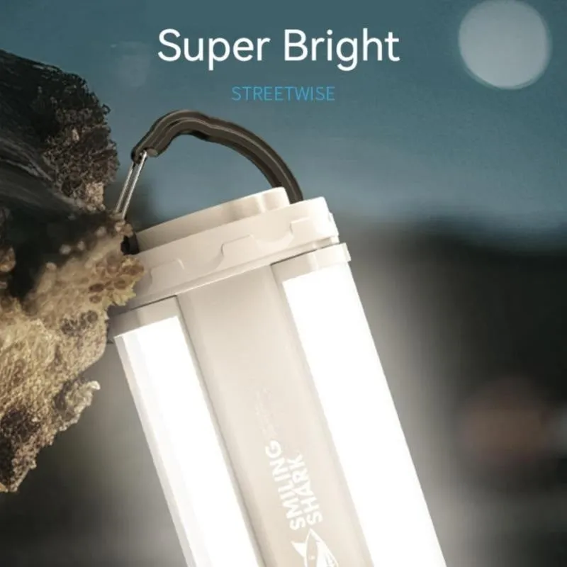 Camping lamp with magnetic charging port showing blue LED indicators and compact 62mm square design