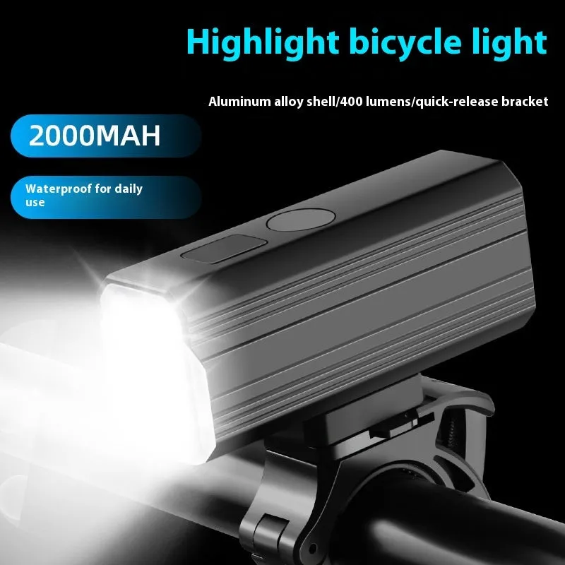 Aluminium alloy bicycle headlight with silicone mount on handlebars showing 400 lumen output