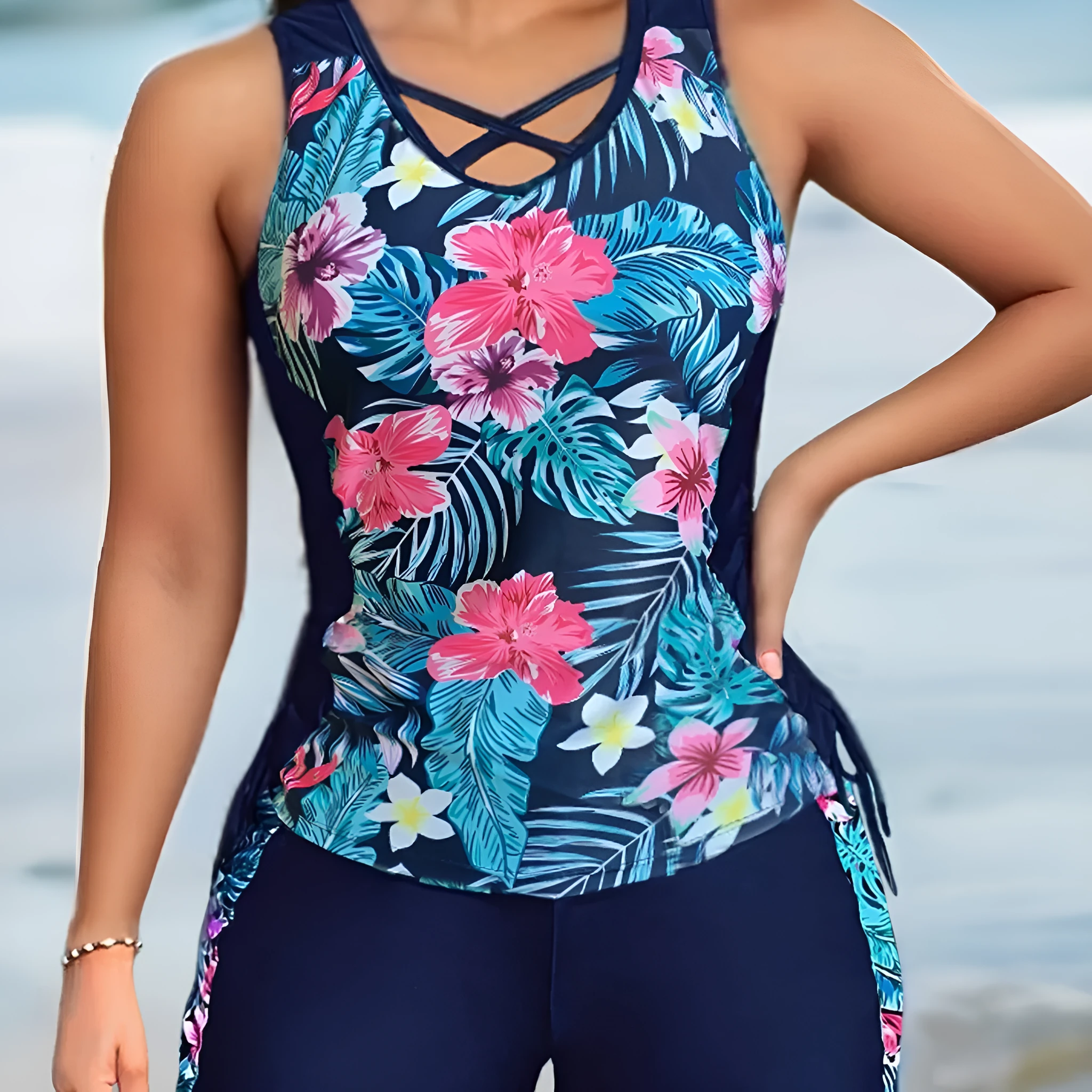 Plus size woman modelling a high waist floral print bikini swimsuit with a backless top.