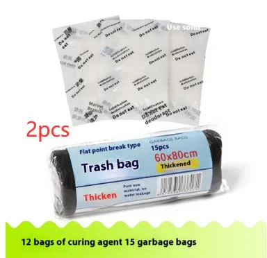 Disposable emergency urine bag kit with black degradable bags and curing agent sachets.