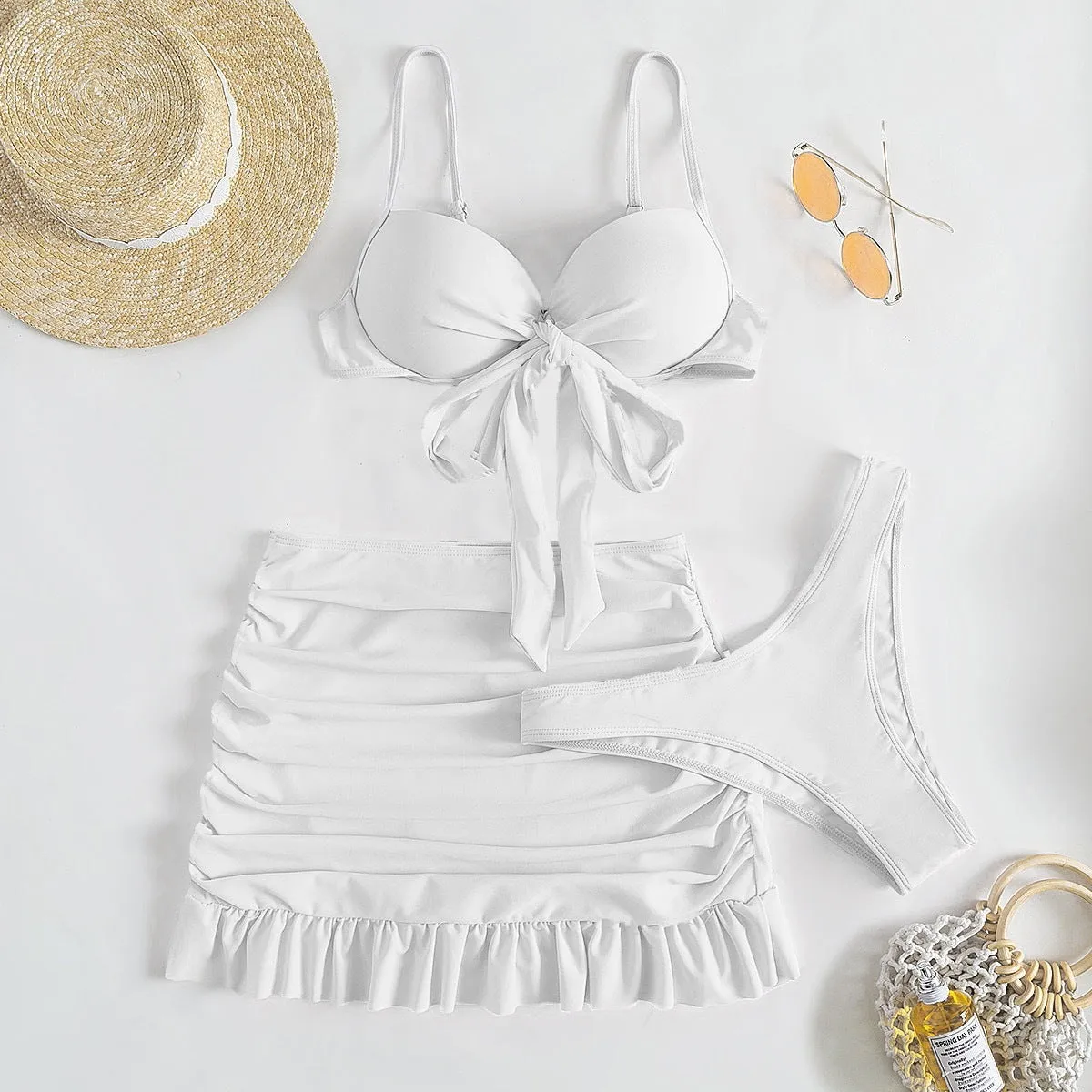 Women's bow split swimsuit three-piece set in floral polyester fabric showing colour options