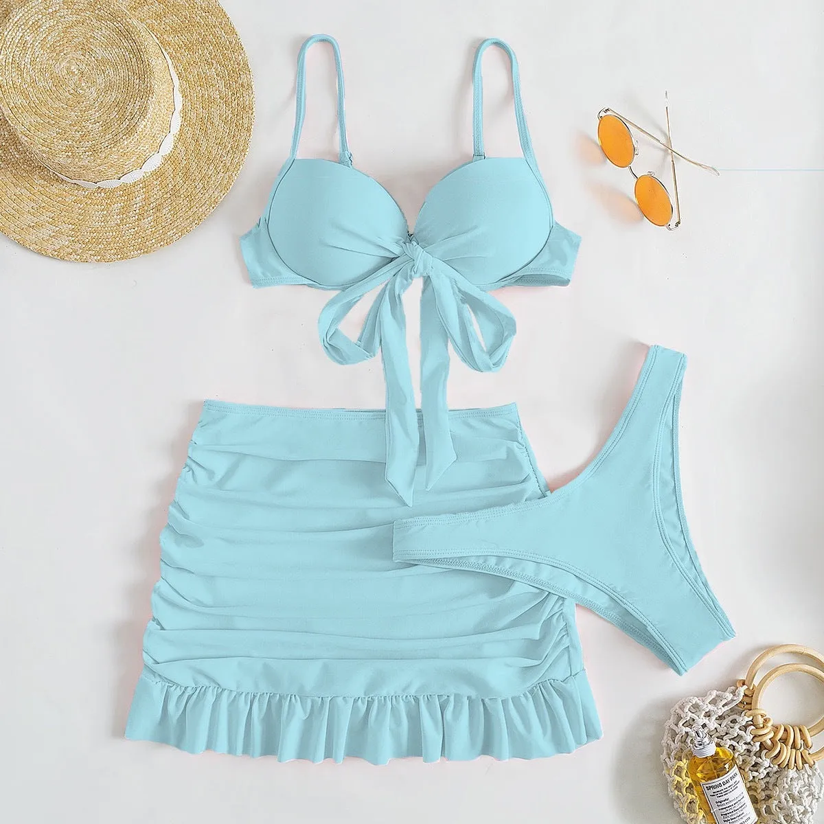 Women's bow split swimsuit three-piece set in floral polyester fabric showing colour options