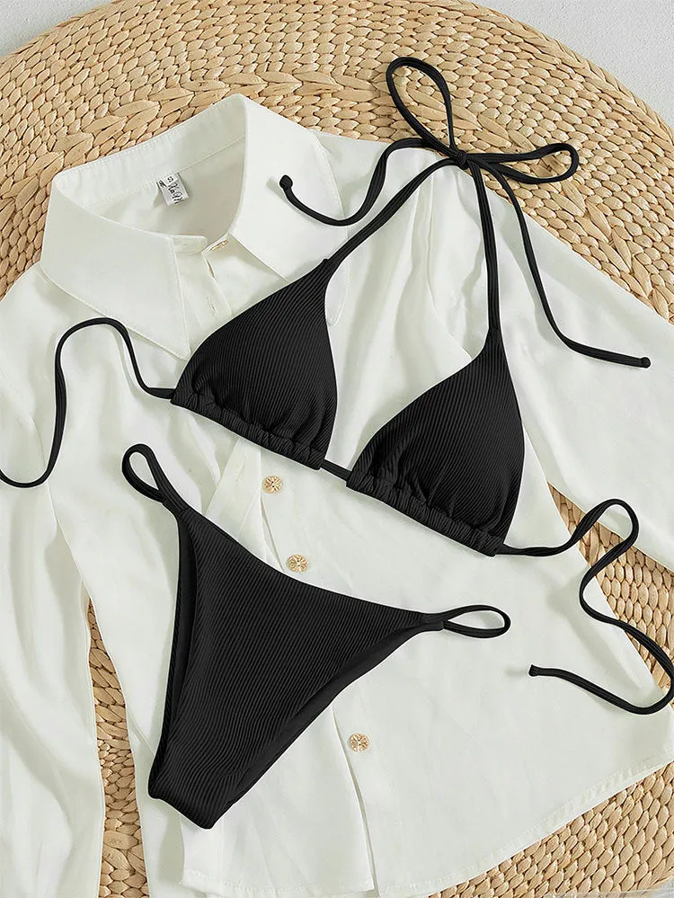 Women's lace up bikini swimsuit in multiple colours on a mannequin, showing front and back design
