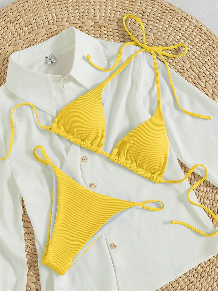 Women's lace up bikini swimsuit in multiple colours on a mannequin, showing front and back design