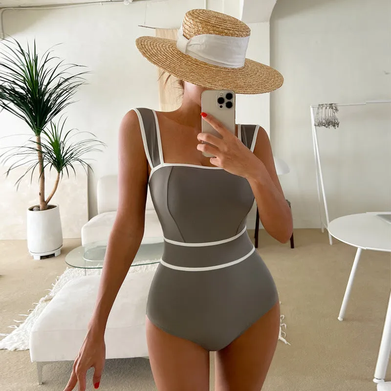 Women's black one-piece swimsuit with lace-up backless design and sleeveless cut