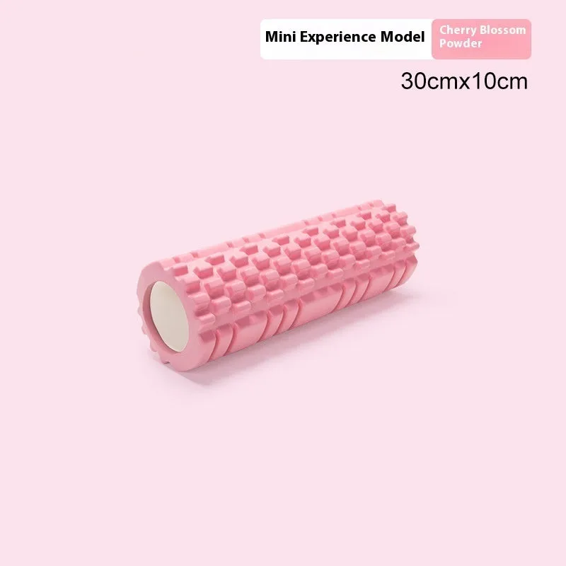 A firm EVA foam roller for fitness and muscle recovery, shown in a selection of colours including pink, blue, and grey.