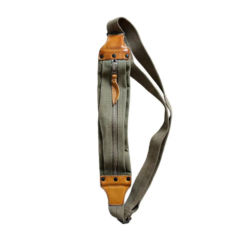 Green American retro military-style chest bag made of washed canvas with Italian leather accents