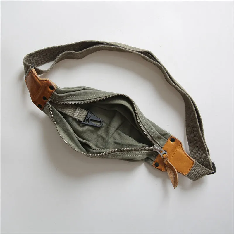 Green American retro military-style chest bag made of washed canvas with Italian leather accents