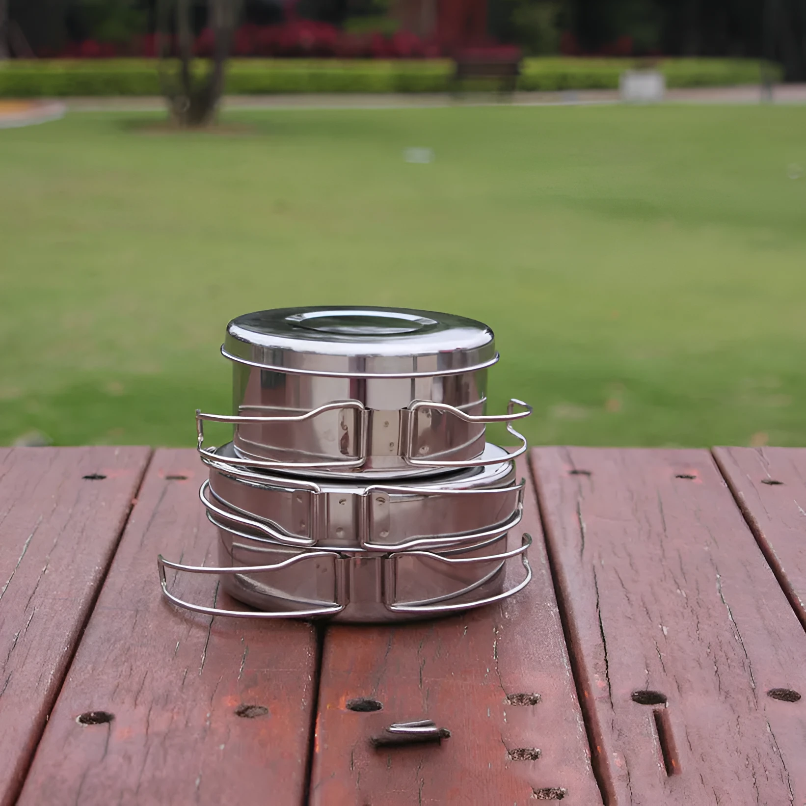 Silver stainless steel camping pot set with round design for outdoor cooking