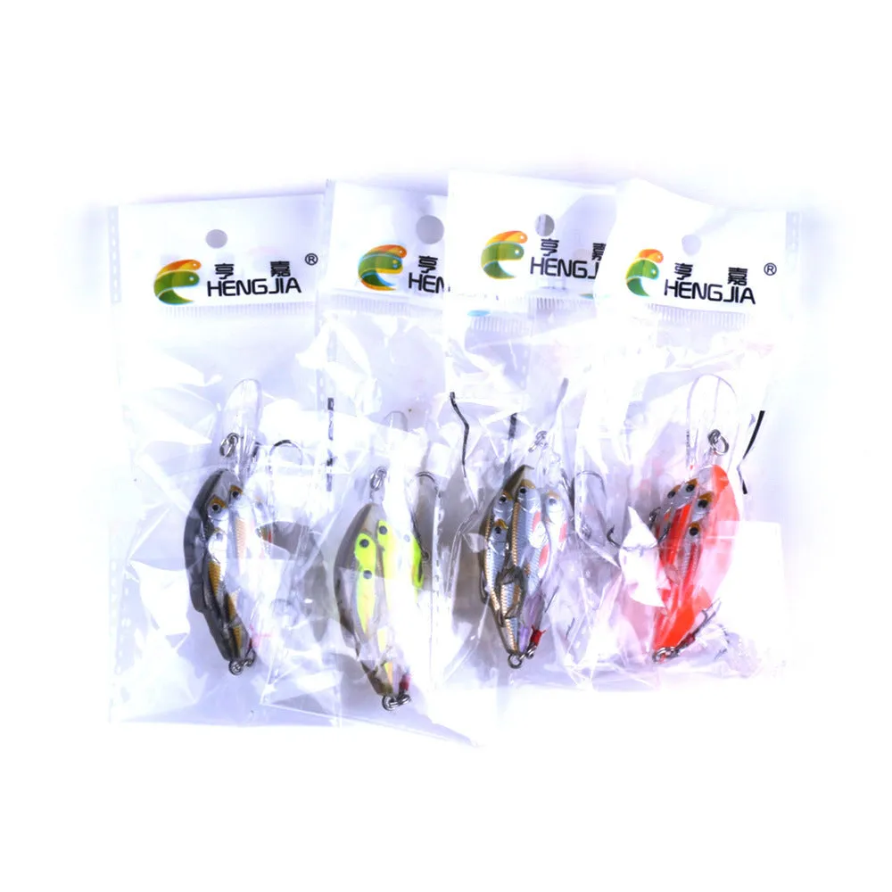 Set of nine multi-colour ABS plastic hard bait fishing lures with feather hooks.