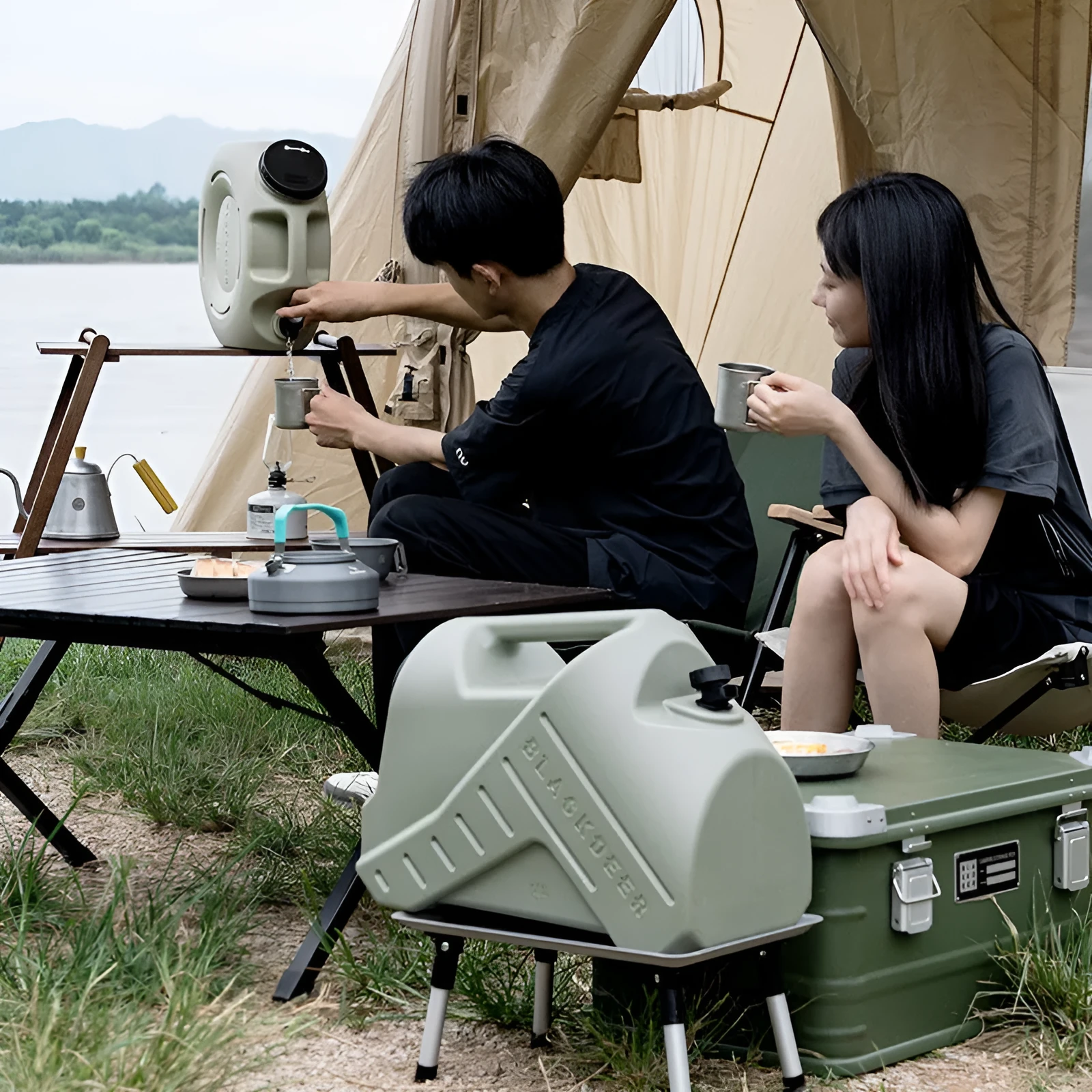 Green portable water storage tank with 13L and 18L capacity options for camping and household use