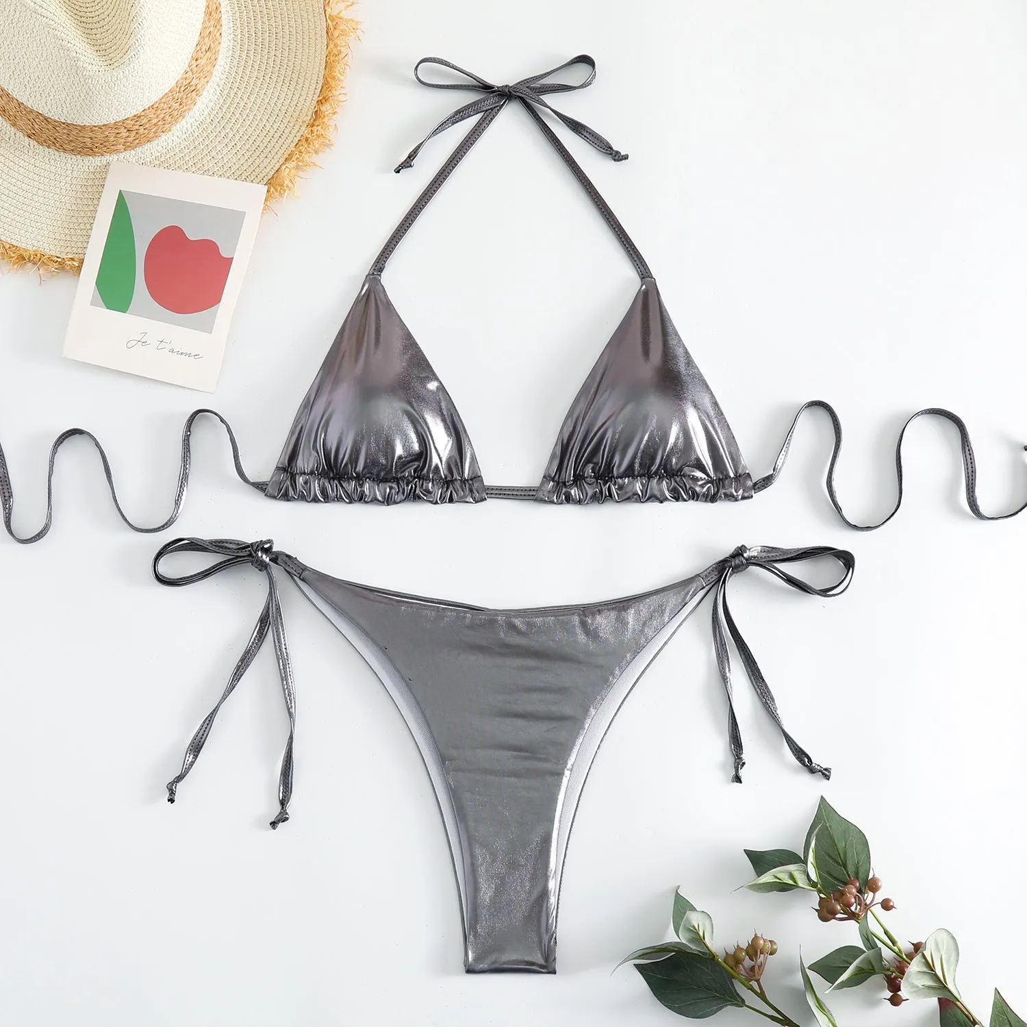 Women's lace-up bikini in metallic colour with adjustable ties and polyester fabric.