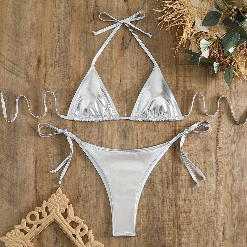 Women's lace-up bikini in metallic colour with adjustable ties and polyester fabric.