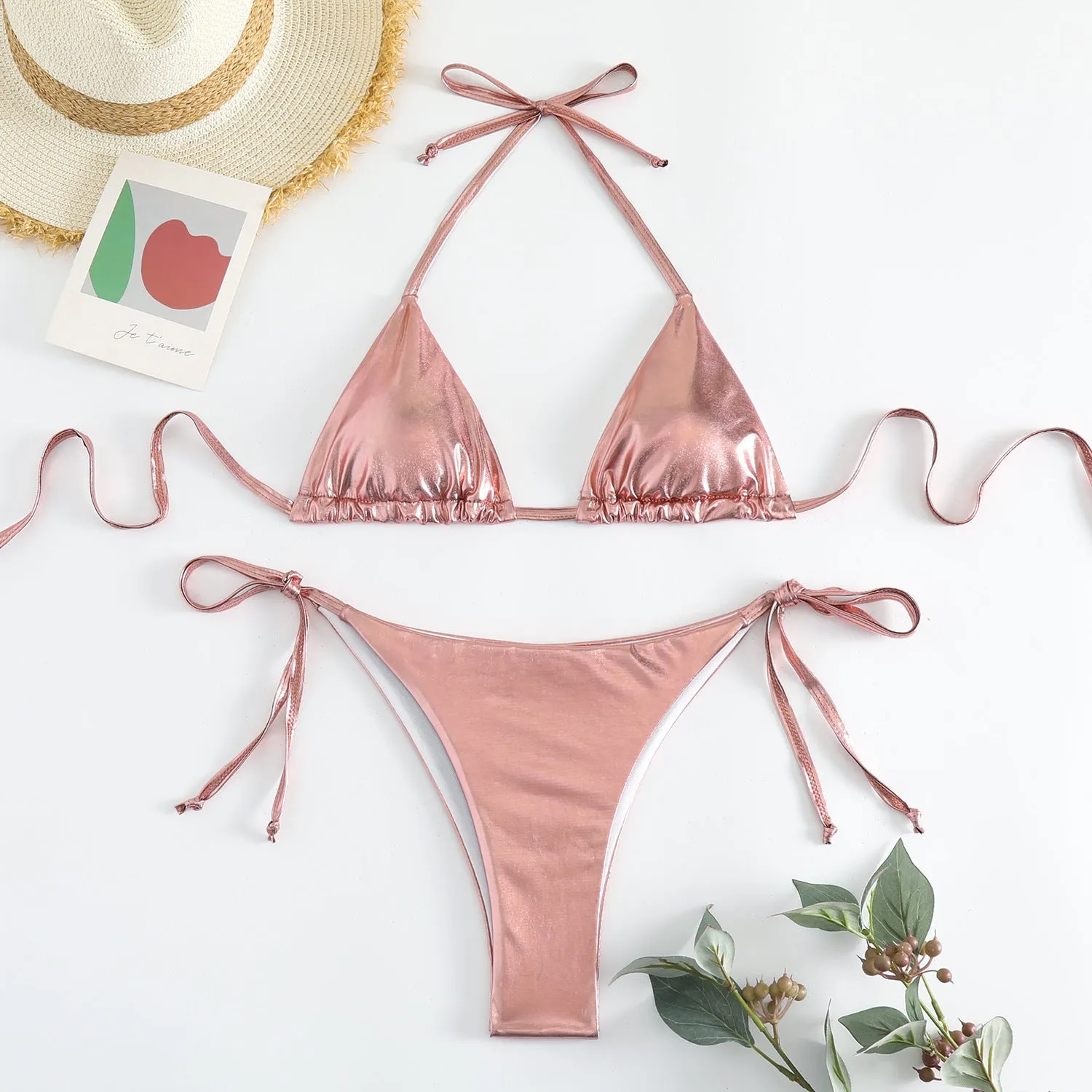 Women's lace-up bikini in metallic colour with adjustable ties and polyester fabric.
