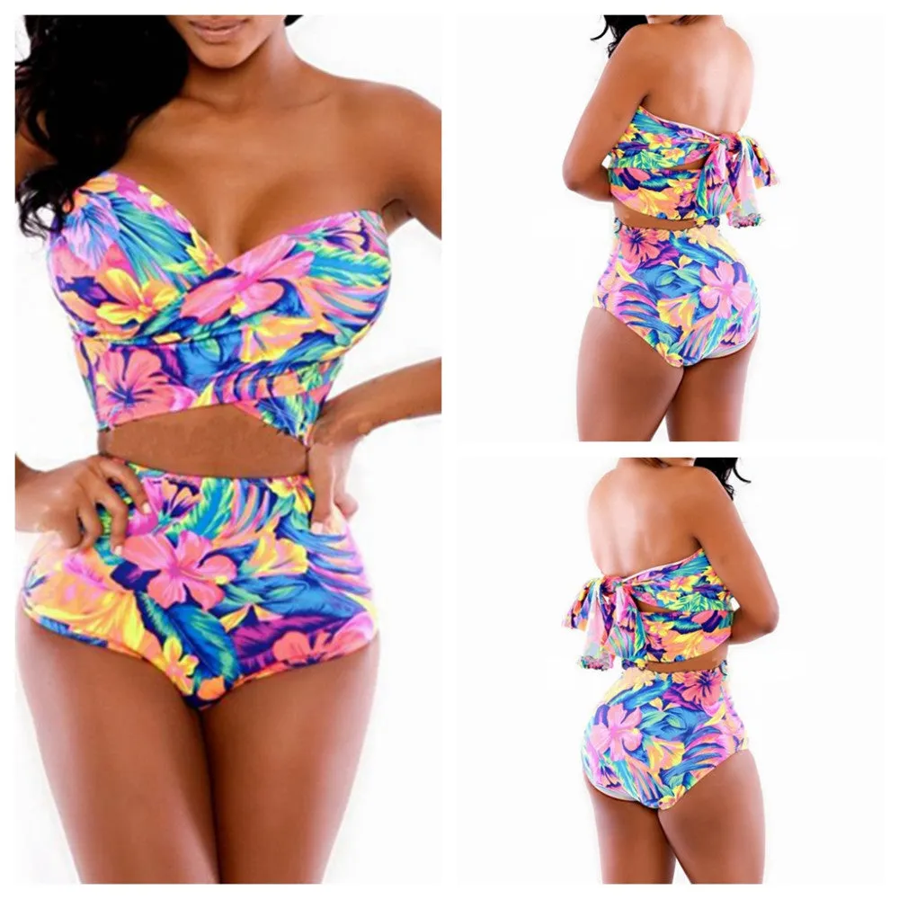 Red printed two-piece swimsuit with chest wrap top and matching pants.