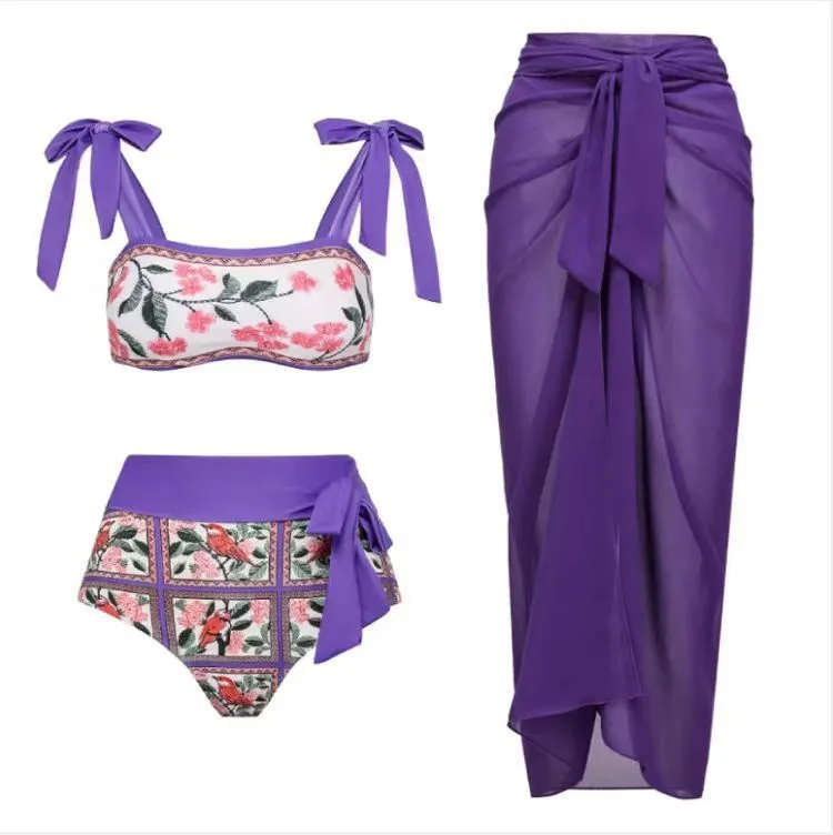 Women's retro three-piece polyester swimsuit set in a conservative, belly-covering design.