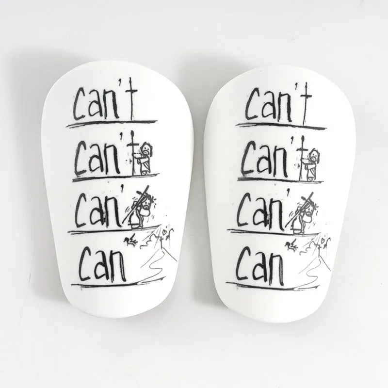 A pair of PU football shin guards in a choice of colours including black, blue, and white.