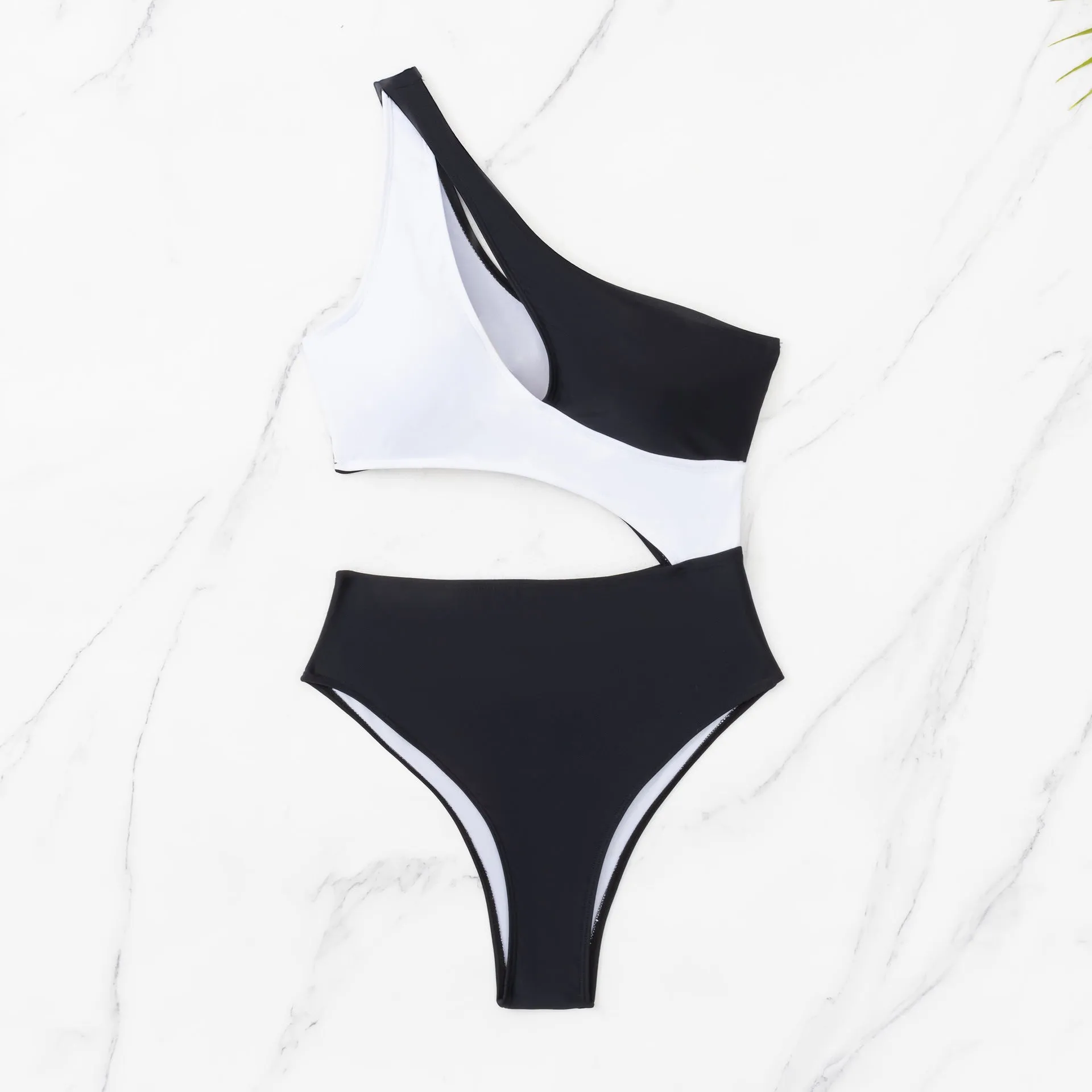 Black women's one-piece swimsuit with white stitching and hollow cut-out design