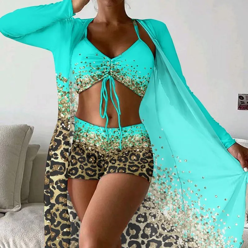 Women's polyester swimsuit set showing sleeveless top and briefs style bottom with matching coat