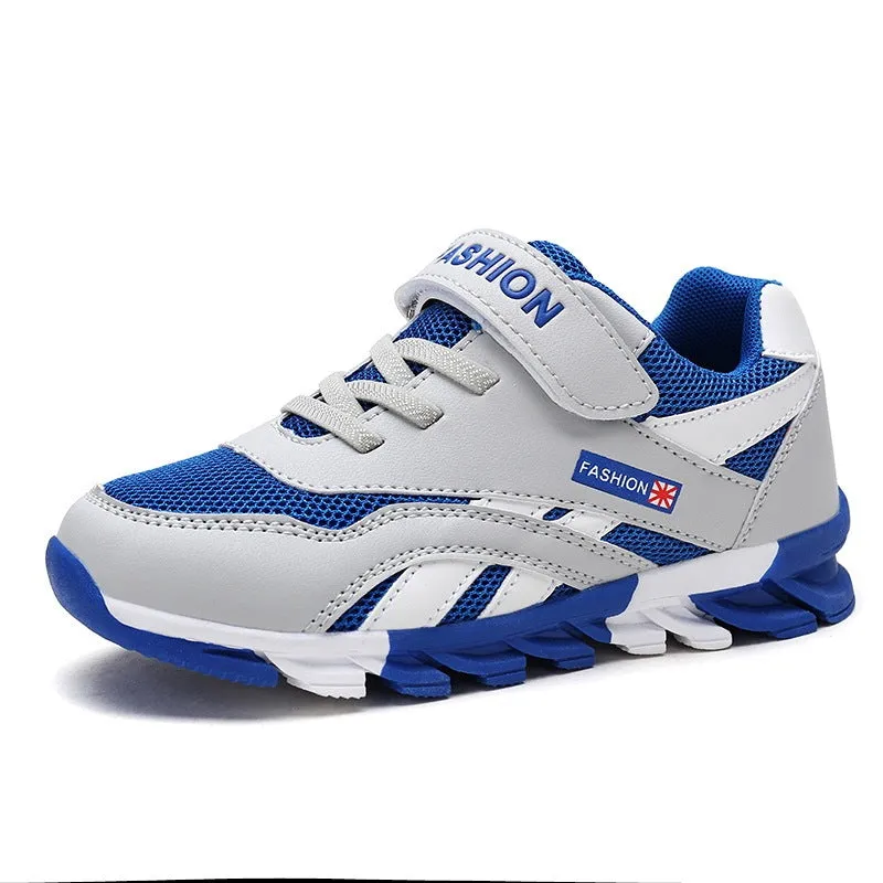 Children's grey Velcro running shoes with synthetic leather upper and rubber sole.