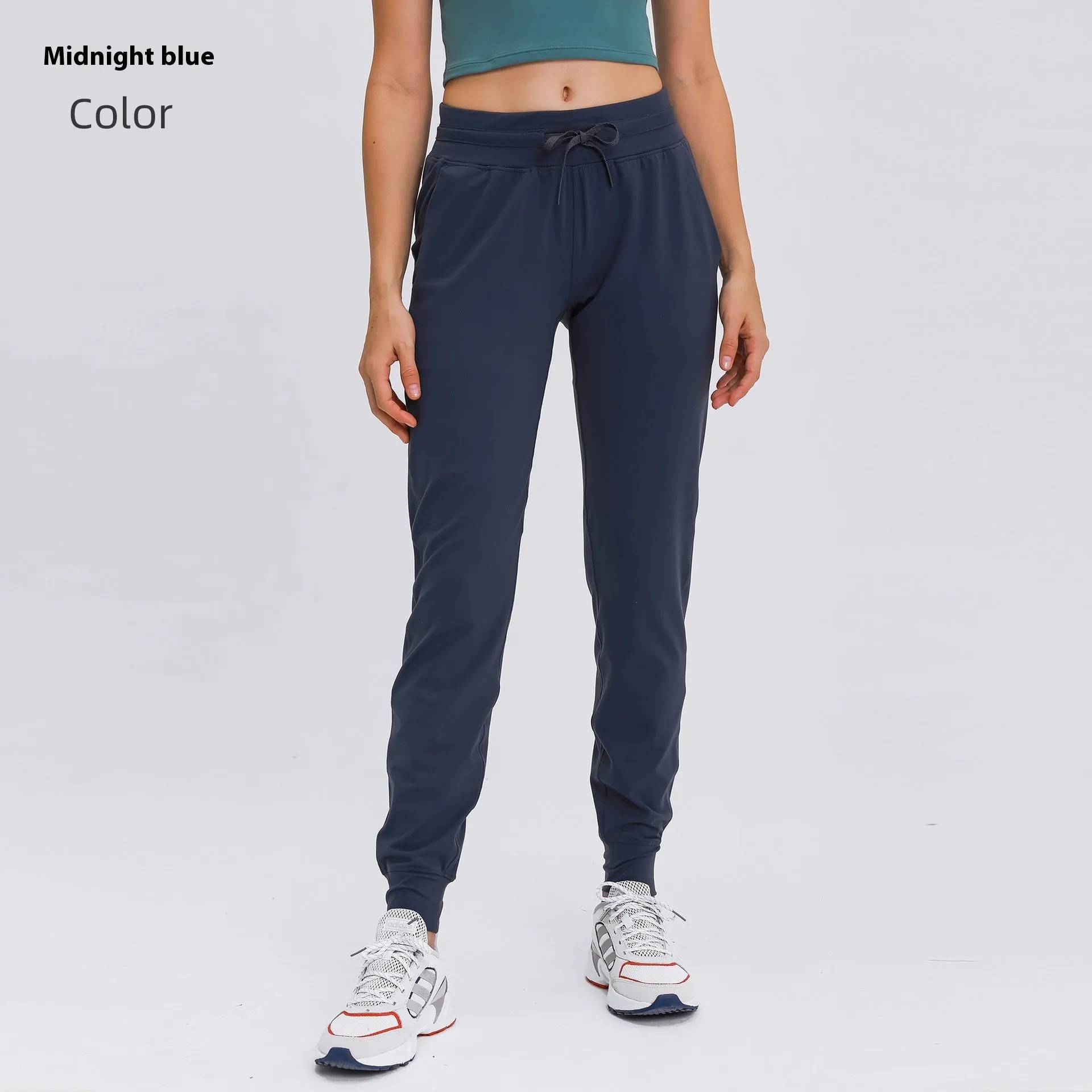 Women's high waist yoga pants with drawstring waistband in cotton blend quick-dry fabric