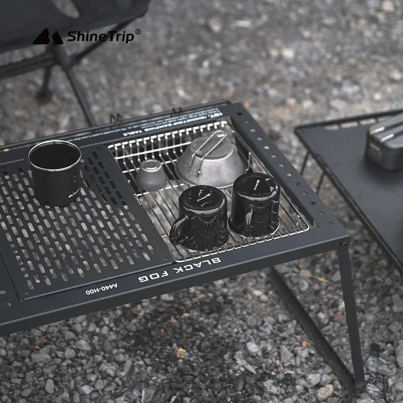 Folding carbon steel camping table with IGT modular system and multiple cell board design options.