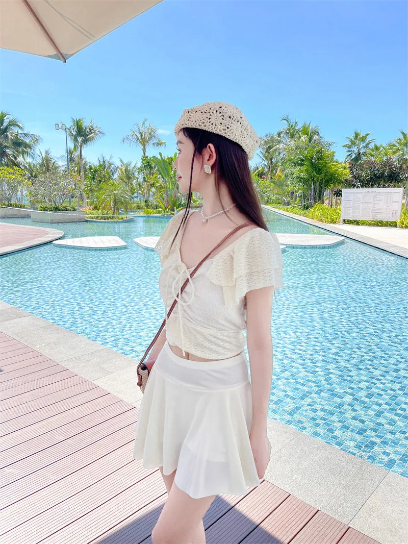 Women's split skirt-style bathing swimsuit in polyester and spandex, black colour, with top and separate skirt