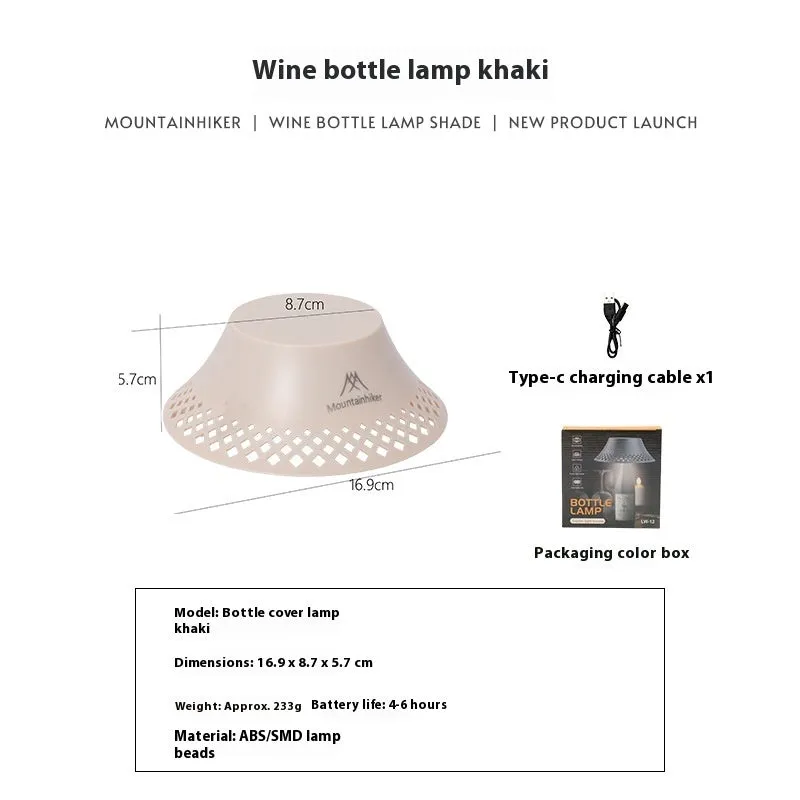 Beige and grey wine bottle-shaped camping lantern showing its compact size and light gear switch.