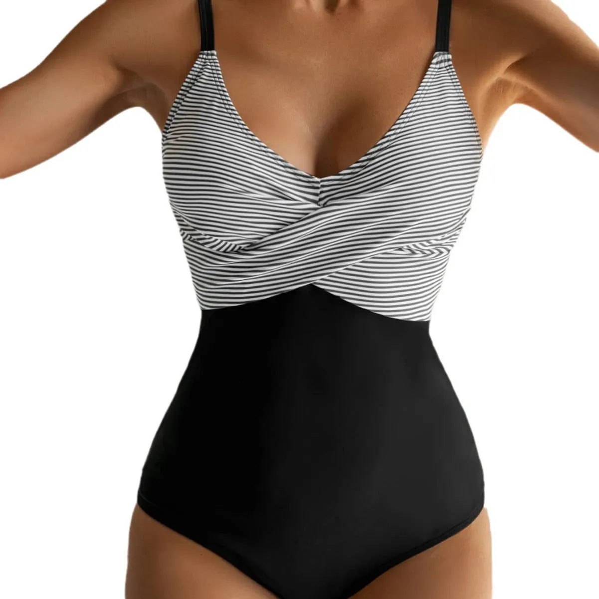 Women's printed one-piece bikini swimsuit with lace-up back detail in a leopard print pattern.