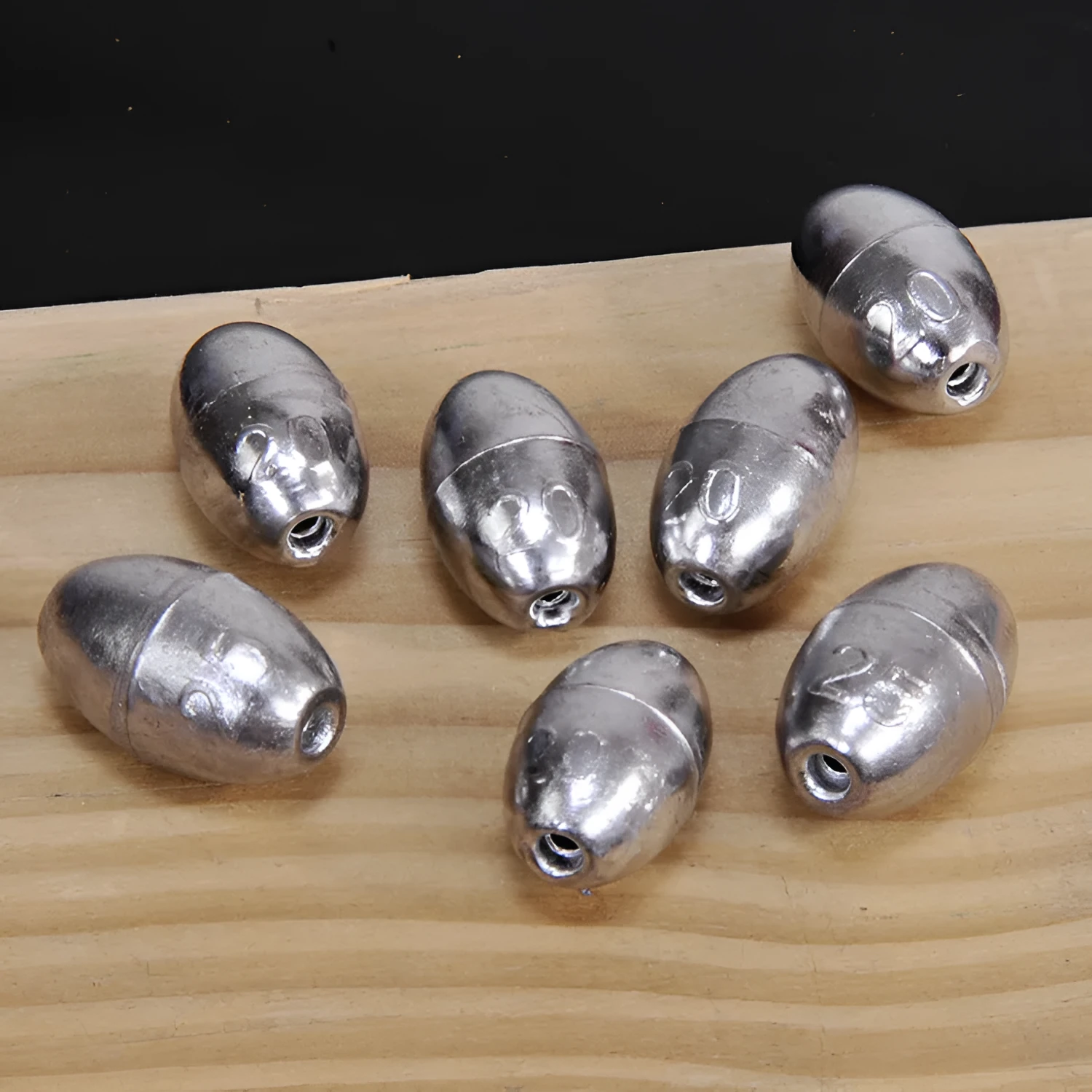 Standard weight olive fishing sinker set in lead with weights from 1g to 20g