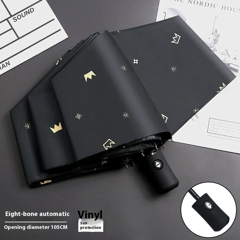 Dual-use automatic eight-bone bronzing feather folding umbrella with black rubber handle and NC fabric canopy
