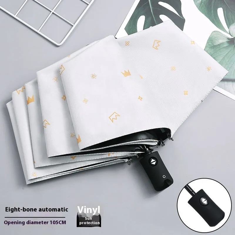 Dual-use automatic eight-bone bronzing feather folding umbrella with black rubber handle and NC fabric canopy