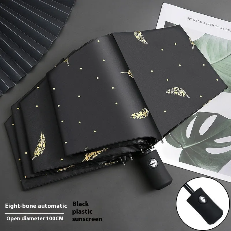 Dual-use automatic eight-bone bronzing feather folding umbrella with black rubber handle and NC fabric canopy