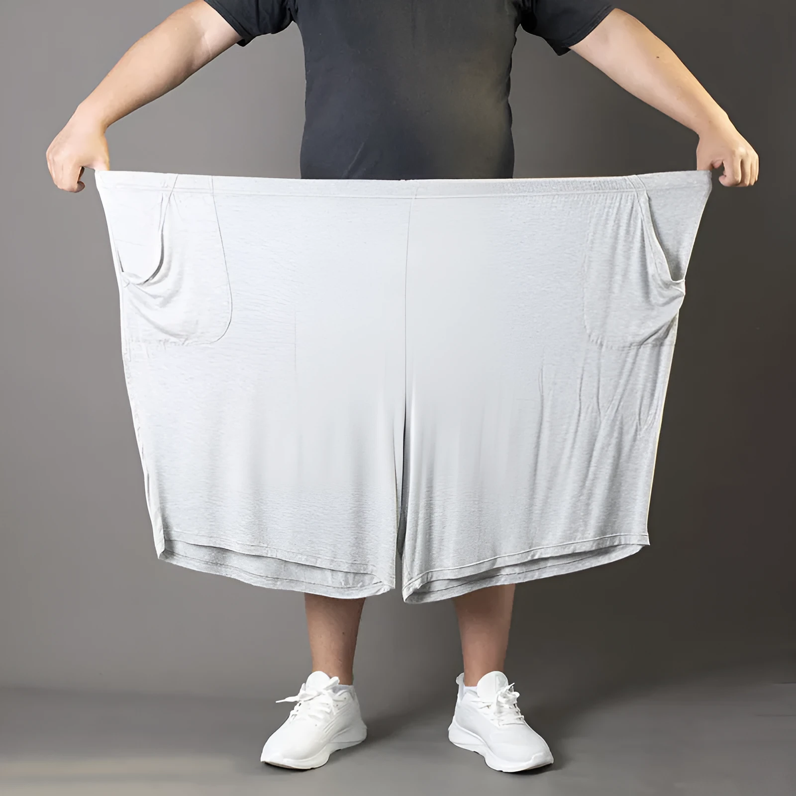 Plus-sized summer thin loose modal pants for overweight men, elastic waist, black colour, available in sizes L to 10XL